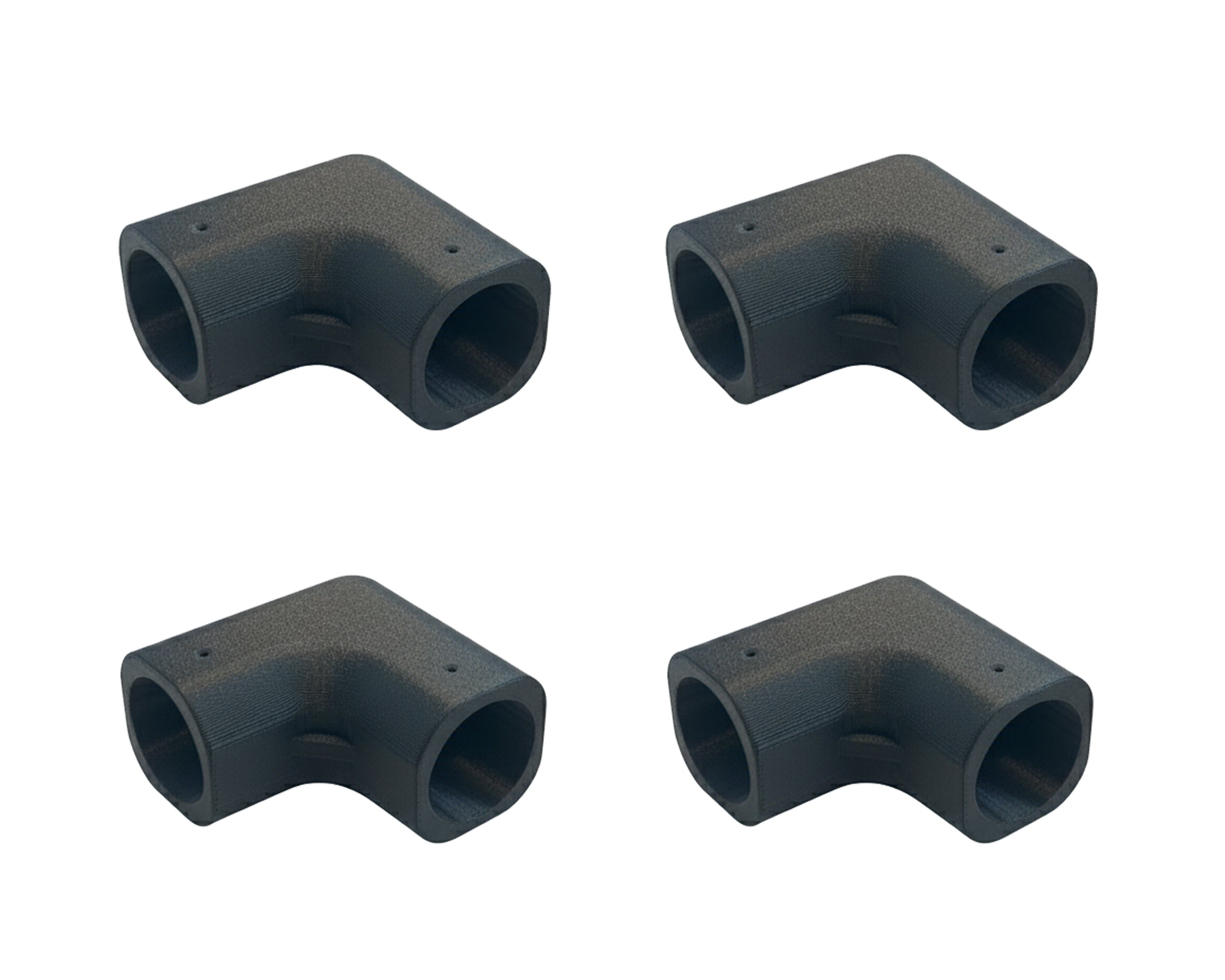 Four black pipe fittings on a white background