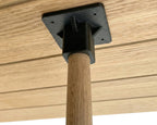 Wooden post with a plastic bracket attached to a wooden surface